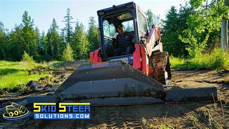 dirt bike track grooming with skid stear|MX Track Maintainence .